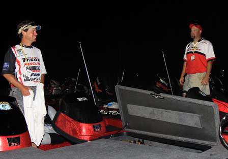Leroy Starling (left) laughs at a statement made by Tim Dolan (left) as they talk in the boat yard while prepping for the final day of the Championship.