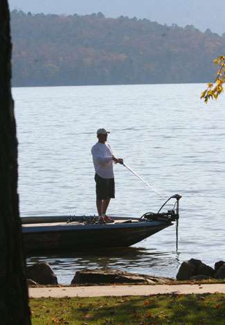 A Weekend Series angler fishes near the check-in site at the end of the first day of competition on Lake Dardanelle.