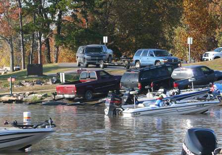 With the first flight of anglers checked in, boats and trucks clog the launch ramp early in the afternoon.