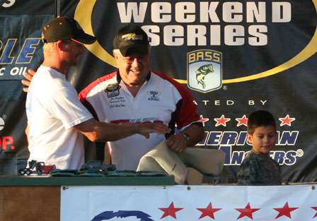 Ben Todd brought his son up to the stage to help him weigh in 6.06 pounds, putting him in 27th after Day One.