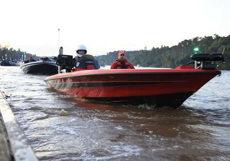 Pro Randy Qualls has his helmet on, indicating a long run on the Atchafalaya Basin, one of the largest bodies of water the Bassmaster Opens attends this year.