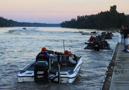 A few of the pros opted to go against the flow, and head upriver as they leave the dock.