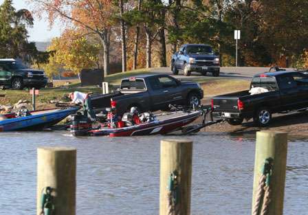 Anglers begin to load their boats after the first flights weighed in their fish at the Lake Dardanelle State Park.