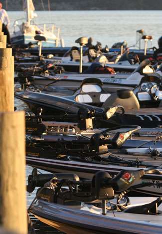 A long line of boats waited tied to the dock as anglers brought fish to the scales and then waited to find out where they landed heading into Day Three.