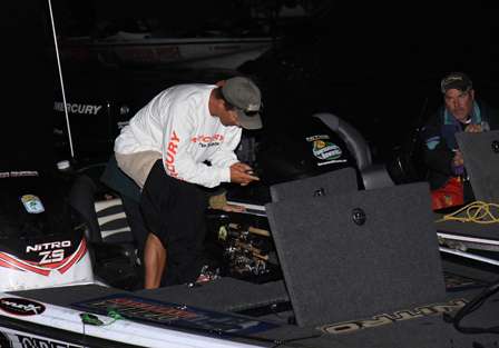 Bassmaster Elite pro Edwin Evers makes final adjustments to his gear as he talks with local pro Dennis Tietje.