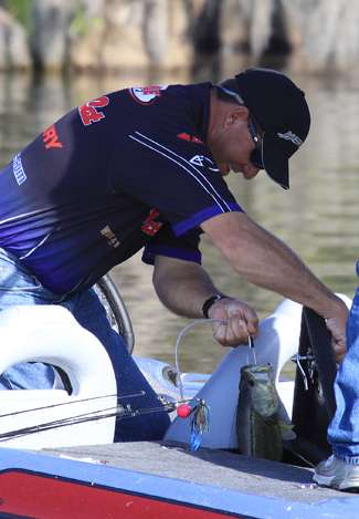 Smith placed a cull marker on the bass, hoping to trade up later in the day. His grin had grown to a full-blown smile.
