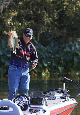 Pro Mark Smith gives the Bassmaster camera a better look at the bass.