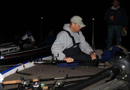 Elite Series pro Russ Lane gathers his tools of war prior to launch on Day Three.