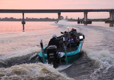 Bassmaster Elite Series pro Chris Lane is hot on Tharp's heals as they clear the launch area and head up the Kissimee toward Lake Okeechobee.