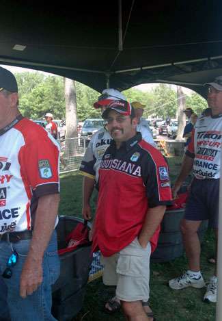 While waiting in line to weigh in his fish on Day Two, Nathan Bourque still manages a smile even though he fell out of the lead in the individual standings. Bourque caught only two bass and dropped to ninth place overall. 