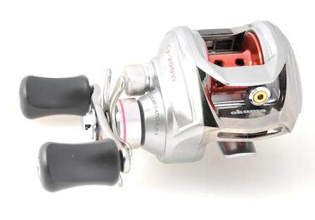 Okuma Cayenne baitcaster<br>This low-profile reel has a 6.2:1 ratio and has nine ball bearings. Its lightweight, slim design makes fishing all day a breeze.