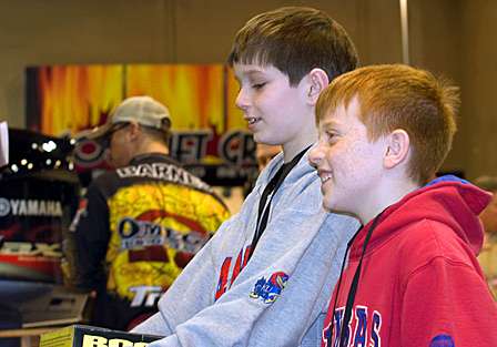 The Bassmaster Classic attracts fans of all ages including Harrison Donally, 11, and Grady Barackman, 10, from Kansas City, Mo.