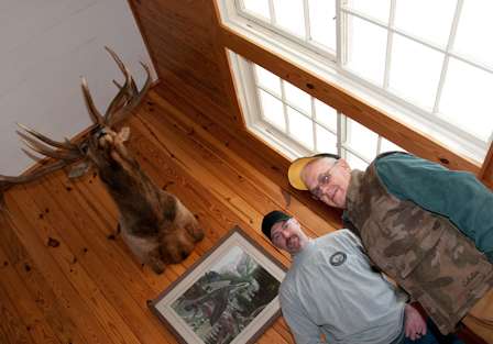 Worley and home owner Charlie Dunkin tour the home prior to a day on the water. 