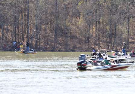 The crowd yells out as Jeff Kriet hauls in another bass. Kriet has hardly moved his boat in two days.