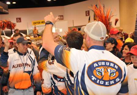 Auburn fans pump up the crowd before the weigh-in.