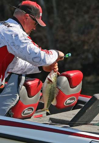 Freeman puts another fish in the live well. 