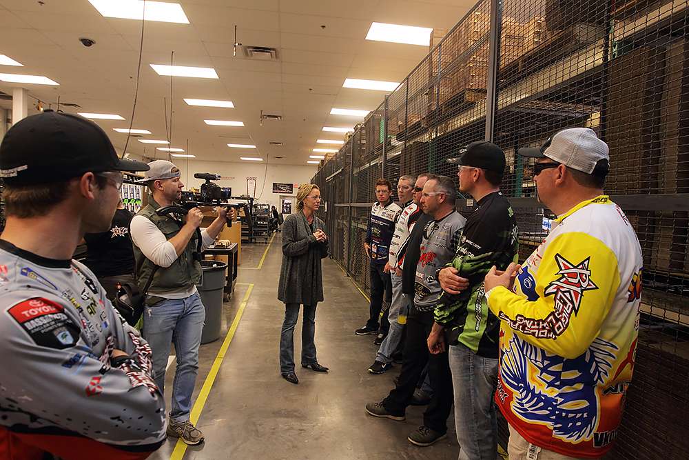 Marketing Manager Miranda Fuller takes anglers to the warehouse.