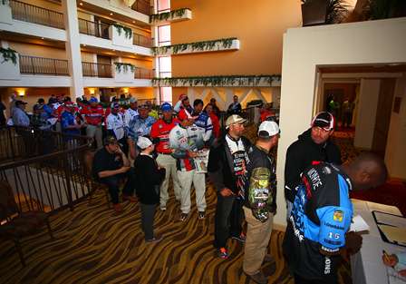 Elite Series anglers begin to arrive at registration to be paired with their Day One Marshal. 