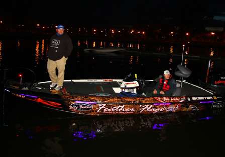 Bill Lowen arrives at the Day Two launch with the length of his boat fashionably lit up.