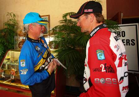 Rick Clunn and Gary Klein talk before the pre-tournament meeting Wednesday.