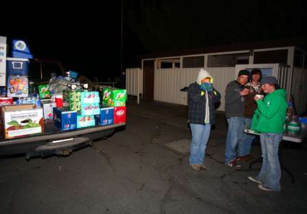 Food and drinks were exchanged for donations as the anglers waited to launch in Lakeport, Calif.