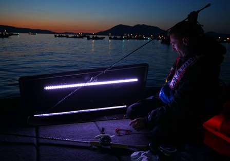 With these handy compartment lights, Howell is able to see enough to remove a few rods for his day of fishing.
