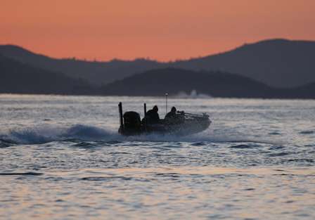 Another angler blasts off as the sun begins to rise on Clear Lake.