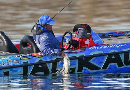 Kiriyama grabs the sizeable Clear Lake bass.
