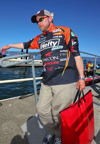 Mike McClelland totes his catch up to the scales in a weigh-in bag on Day One of the Golden State Shootout.