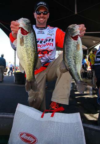 Randy Howell shows off two of the fish that helped him to a third-place showing on Day One of the Golden State Shootout.