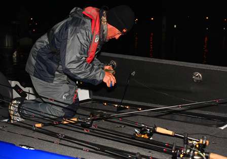 Terry Butcher made a big move on Day Three to qualify for the final round of competition and modifies a swimbait before his day begins.