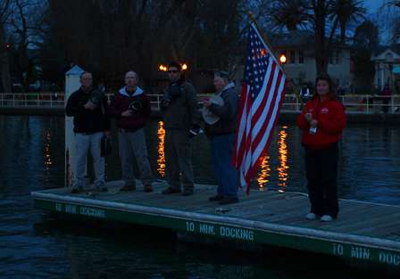 The playing of the national anthem signaled that the day of fishing was about to get started.