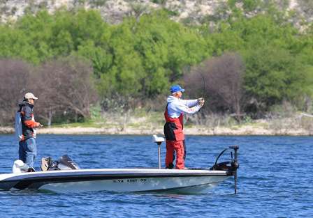Trent Huckaby casts with co-angler Luis Sevilla in the back.
