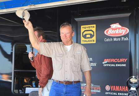 After all of the co-anglers weigh in, Koebcke simply tips his hat to the crowd as they congratulate him on the non-boater win.