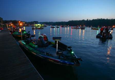 Anglers wait for the morning launch time after a fog delay was announced. 