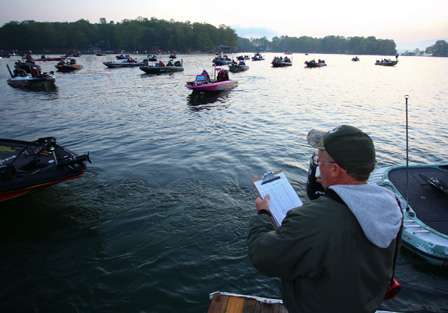 Senior Tournament Director, Chuck Harbin orchestrates the morning takeoff on Smith Mountain Lake. 