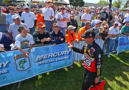 Kevin VanDam greets spectators after sacking his limit of fish. 