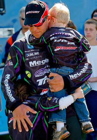 Aaron Martens received hugs from his children after the Day Four weigh-in. 