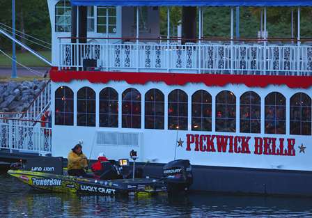 Skeet Reese finds a place to tie-up near the Pickwick Belle while making last minute tackle adjustments. 