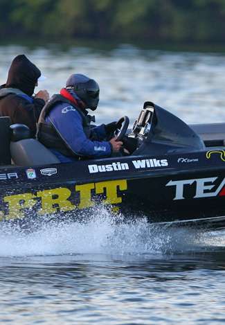 Dustin Wilks wore a facemask to protect himself during the long boat ride he would take on Day One. 