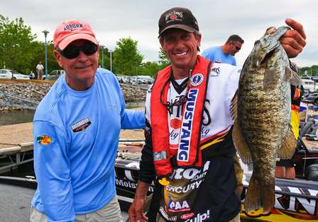 Kevin Wirth and his Day Two Marshal with one of the heaviest smallmouth bass of the tournament. 