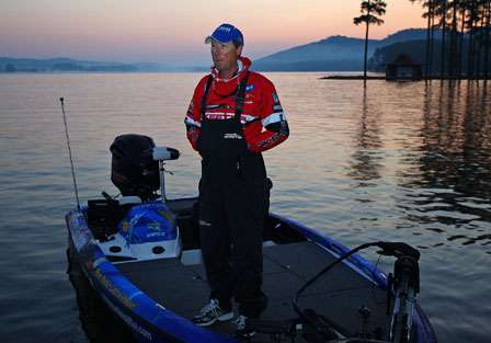 Mark Burgess pulls up to the dock looking for his Marshal as the sun begins to rise over Lake Guntersville.