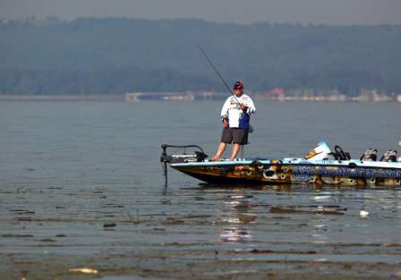 Floating debris from recent heavy rains was creating a problem on Kenyon Hill's fishing spot. 