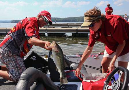 Britt Myers sacks his fish before weighing in on Day One of the Synergy Southern Challenge. 