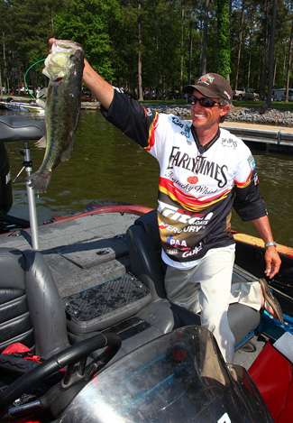 Kevin Wirth is all smiles as he jerks his best fish of the day from the livewell. 