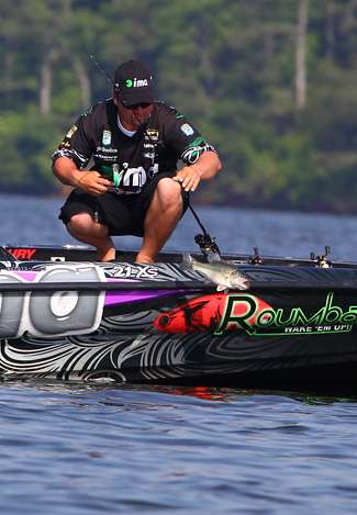 Roumbanis releases a small bass that won't help his Day Two limit. 