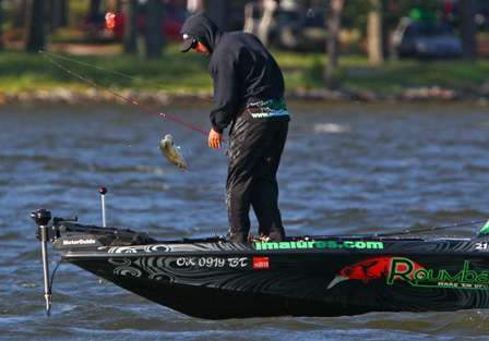 Roumbanis snatches one more fish into the boat before the cameras pulled away. 