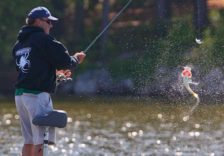 Hite pulls another feisty bass into the boat, but it won't help his Day Four weight. 