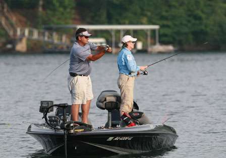 Pro Ronnie Getz makes a long cast toward a long point early on Day Two as his co-angler Miriam Donohoo concentrates on her lure and presentation.