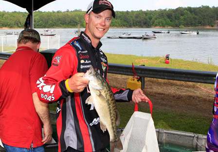 Jonathon VanDam holds up one of his fish on Day One. VanDam was confident he could bring more fish to the scales on Day Two.